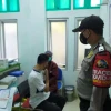 Pengamanan Vaksinasi Covid-19 Terus Dilaksanakan Polsek Jonggol Demi Terwujudnya Percepatan Vaksinasi