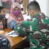 Kerja Bareng DPMD &amp; TNI-AL dalam Upaya Pembentukan Kekebalan Komunal ASN DPMD &amp; Keluarga