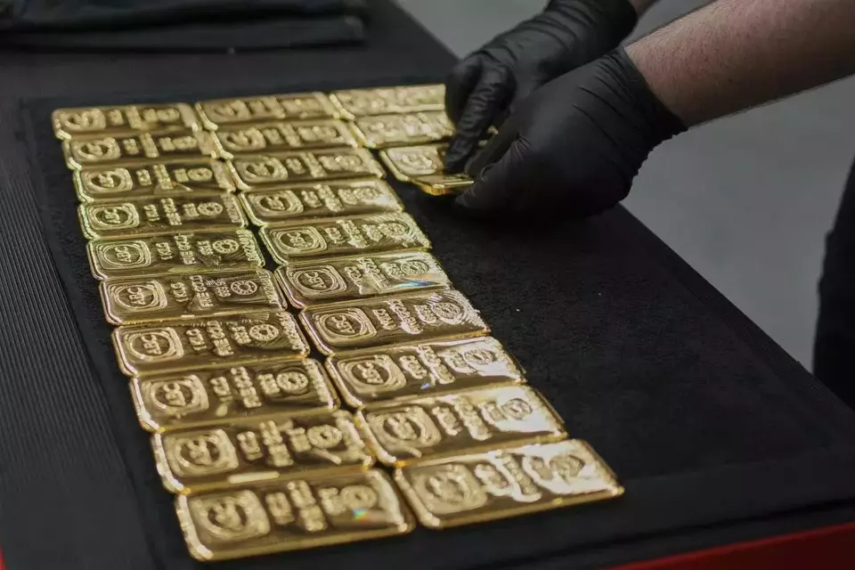 Ilustrasi emas. (AP)