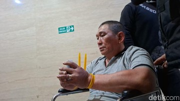 Foto: Ko Erwin bandar narkoba tiba di Bareskrim Polri  (Ondang/detikcom).