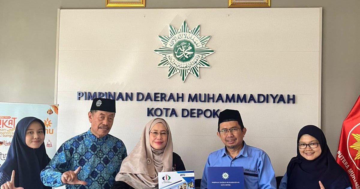 Pendatanganan MoU LazisMu Kota Depok dengan BPRS Alhijrah Amanah.Foto.AL