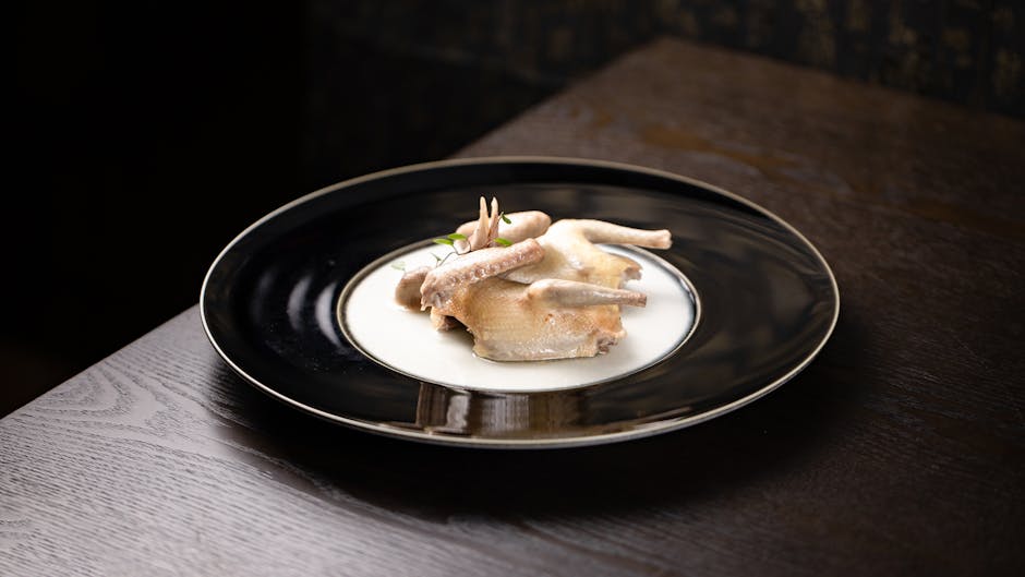 A variety of delicious halal Korean dishes like Bibimbap and Tteokbokki served on a wooden table with a clear halal certification sign.